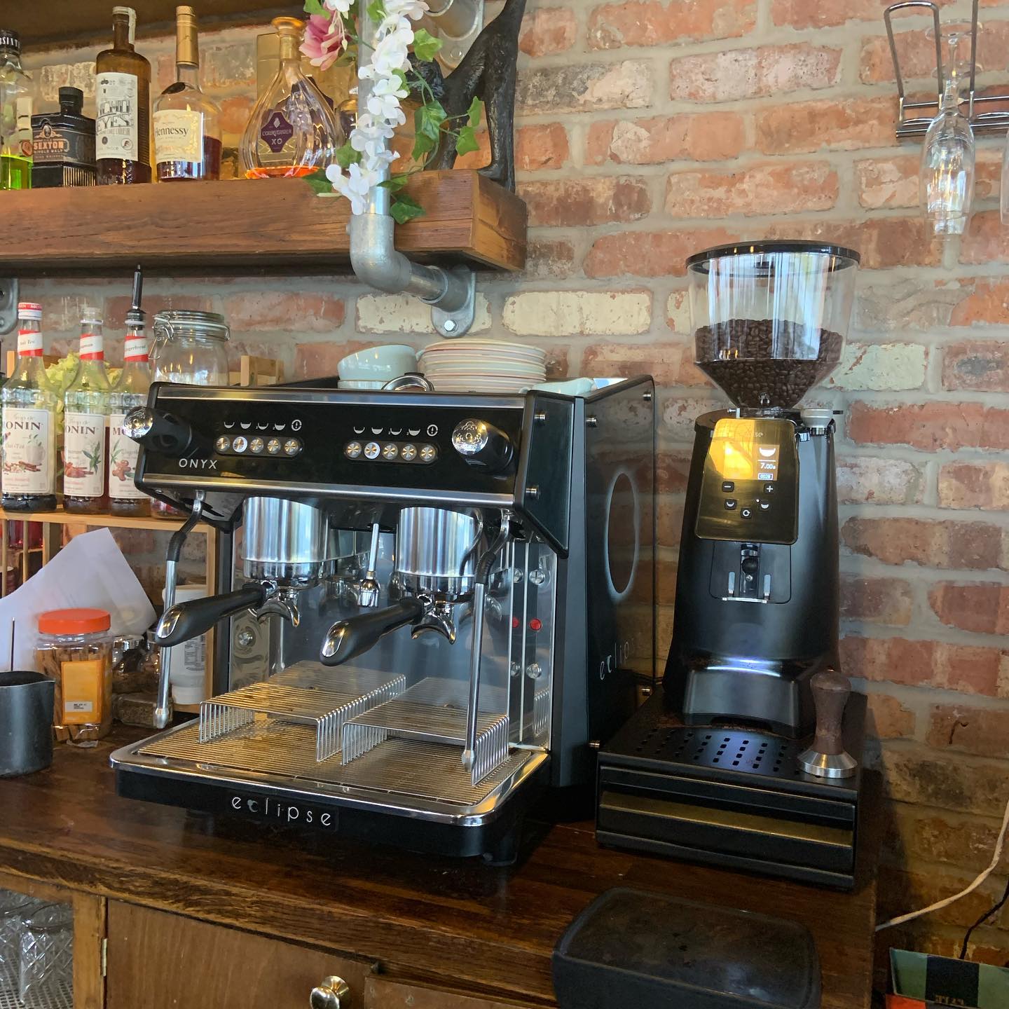 Coffee machine engineer replacing internal components during expert repair and maintenance work