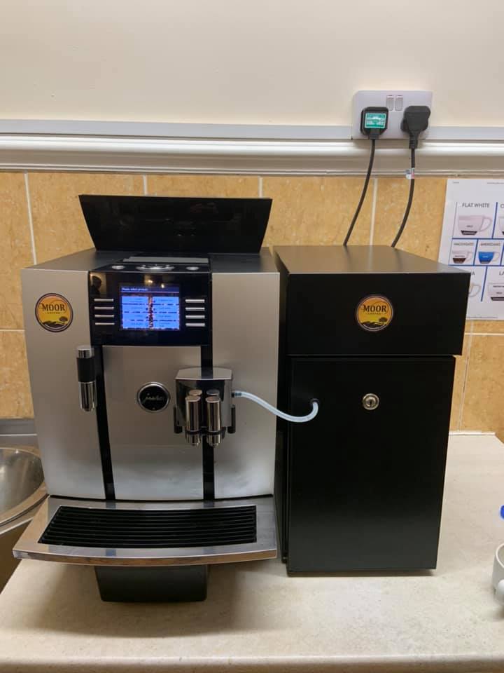 Restored Jura coffee machine brewing perfect espresso after professional service and repair work